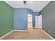 Colorful bedroom with neutral carpet and a walk-in closet at 7033 Twin Forks Peak St, Las Vegas, NV 89166