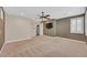 Comfortable bedroom features carpet and a modern ceiling fan at 7033 Twin Forks Peak St, Las Vegas, NV 89166
