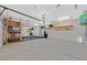 Spacious garage with ample storage shelving and epoxy flooring at 7033 Twin Forks Peak St, Las Vegas, NV 89166