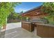 Well-appointed outdoor gazebo with built-in bar, perfect for outdoor entertaining at 7033 Twin Forks Peak St, Las Vegas, NV 89166