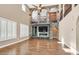 Spacious living room boasts stone accent wall, built-ins, and fireplace at 7033 Twin Forks Peak St, Las Vegas, NV 89166