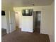 Bedroom featuring neutral tones, ensuite bathroom, and closet at 761 Bourbon St # 5, Pahrump, NV 89048