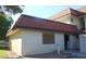 Exterior view of home featuring stucco siding and a red tile roof at 761 Bourbon St # 5, Pahrump, NV 89048