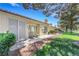 Beautiful backyard with a patio area and green grass, perfect for relaxing at 7909 Canoe Ln, Las Vegas, NV 89145