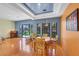 Dining room with hardwood floors and a view of the backyard at 7909 Canoe Ln, Las Vegas, NV 89145