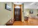 Home foyer with beautiful hardwood floors, decorative door and nice decor at 7909 Canoe Ln, Las Vegas, NV 89145