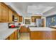 Modern kitchen with white countertops and stainless steel appliances at 7909 Canoe Ln, Las Vegas, NV 89145