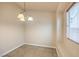 Cozy dining room with natural light and tile flooring at 7998 Base Camp Ave, Las Vegas, NV 89178