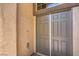 Close-up showcasing a double door front entrance with sidelight window, offering both style and natural light at 7998 Base Camp Ave, Las Vegas, NV 89178