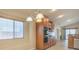 Kitchen with stainless steel appliances, view to backyard patio at 7998 Base Camp Ave, Las Vegas, NV 89178