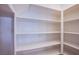 Walk-in pantry with ample shelving for organized storage at 8026 Sunset Creek St, Las Vegas, NV 89113
