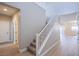 Bright staircase with white railings and carpeted steps leading to the upper level at 8026 Sunset Creek St, Las Vegas, NV 89113