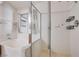 Well-maintained bathroom with a bathtub and a tiled shower, equipped with shelving for storage at 812 Bitterroot St, Henderson, NV 89002