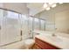 Cozy bathroom with a shower-tub combo, toilet, and sink with vanity, providing essential functionality at 812 Bitterroot St, Henderson, NV 89002