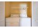 Functional laundry area featuring a washer and dryer, maximizing convenience for daily chores at 812 Bitterroot St, Henderson, NV 89002