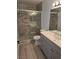 Updated bathroom features a modern vanity, and beautifully tiled walk-in shower at 8455 W Sahara Ave # 258, Las Vegas, NV 89117