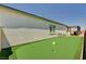 Backyard with a putting green, perfect for outdoor recreation and entertainment at 8934 Windgate Ranch St, Las Vegas, NV 89166
