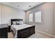 Bedroom with two windows at 8934 Windgate Ranch St, Las Vegas, NV 89166