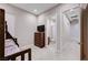 Cozy bedroom featuring a bunk bed, dresser, and access to an attached bathroom with tile flooring at 8934 Windgate Ranch St, Las Vegas, NV 89166