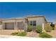 Beautiful single-story home with a two-car garage and desert landscaping at 8934 Windgate Ranch St, Las Vegas, NV 89166