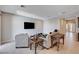 Bright living room with tile flooring, recessed lighting, and comfortable seating at 8934 Windgate Ranch St, Las Vegas, NV 89166