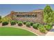 Stone monument sign for Montrose featuring manicured landscaping and a welcoming entrance to the neighborhood at 8934 Windgate Ranch St, Las Vegas, NV 89166