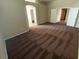 A spacious bedroom featuring neutral paint, high ceilings and plush brown carpeting at 8959 Coral Shale St, Las Vegas, NV 89123