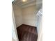 An empty closet featuring white shelving and brown carpeting at 8959 Coral Shale St, Las Vegas, NV 89123