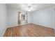 A bedroom with natural lighting and wood laminate flooring at 901 E Jaybird St, Pahrump, NV 89048
