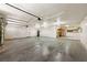 Spacious three-car garage with ample storage and a work area at 901 E Jaybird St, Pahrump, NV 89048