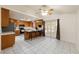 Spacious kitchen featuring tile flooring and breakfast bar, perfect for casual dining at 901 E Jaybird St, Pahrump, NV 89048