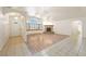 Inviting living room featuring tile and wood floors and a stone fireplace at 901 E Jaybird St, Pahrump, NV 89048