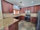 Well-equipped kitchen with granite countertops, stainless steel appliances, and ample cabinet space at 9530 Windsor Forest Ct, Las Vegas, NV 89123
