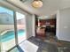 Bright kitchen with stainless steel appliances and access to a private pool area at 9530 Windsor Forest Ct, Las Vegas, NV 89123