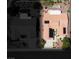 Aerial view of a house with solar panels on the roof, surrounded by green trees at 9704 Brawley Dr, Las Vegas, NV 89134