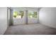 Bright bedroom with large windows providing ample natural light and neutral carpeting at 9704 Brawley Dr, Las Vegas, NV 89134