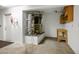 Utility room featuring water heater, workbench, and storage cabinets for efficient home maintenance at 9704 Brawley Dr, Las Vegas, NV 89134