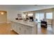 Stylish kitchen island, adjoining the living area, great for modern living at 10243 Songsparrow Ct, Las Vegas, NV 89135