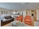 Cozy open floor plan showcasing a kitchen, dining, and living area with neutral colors at 10243 Songsparrow Ct, Las Vegas, NV 89135