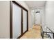 Elegant entryway with frosted glass doors, tiled floors, archway, and stylish decor at 10381 Borah Park Cir, Las Vegas, NV 89178