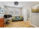 Bright office space with hardwood floors, stylish lighting, and an adjacent bathroom at 10381 Borah Park Cir, Las Vegas, NV 89178