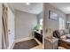 Entrance featuring tile flooring, a plant and view into the living room at 105 Lighthouse Dr # 105, Boulder City, NV 89005
