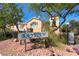 Charming Bayview home with desert landscaping, lush trees, and attractive architecture at 105 Lighthouse Dr # 105, Boulder City, NV 89005