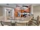 Kitchen featuring wood cabinets, tile floors, granite countertops and stainless appliances at 105 Lighthouse Dr # 105, Boulder City, NV 89005
