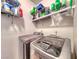A modern laundry room featuring a washer and dryer at 105 Lighthouse Dr # 105, Boulder City, NV 89005