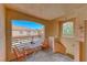 View of a cozy outdoor patio featuring seating with a neighborhood view and natural light at 105 Lighthouse Dr # 105, Boulder City, NV 89005