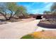 Picturesque view of a community pathway and underpass with mature trees and lush landscaping at 105 Lighthouse Dr # 105, Boulder City, NV 89005
