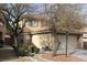 Charming two-story home with a well-manicured front yard and an attached two-car garage at 11016 Meadow Leaf Ave, Las Vegas, NV 89144