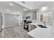 Light and bright kitchen features stainless steel appliances, quartz countertops, and ample cabinet space at 11016 Meadow Leaf Ave, Las Vegas, NV 89144