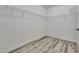 Spacious walk-in closet with ample shelving, offering plenty of storage for clothes and accessories at 11016 Meadow Leaf Ave, Las Vegas, NV 89144